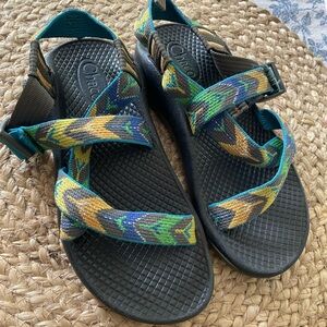 Chaco kids sandals; gray sole with adjustable straps in fun multi colored print